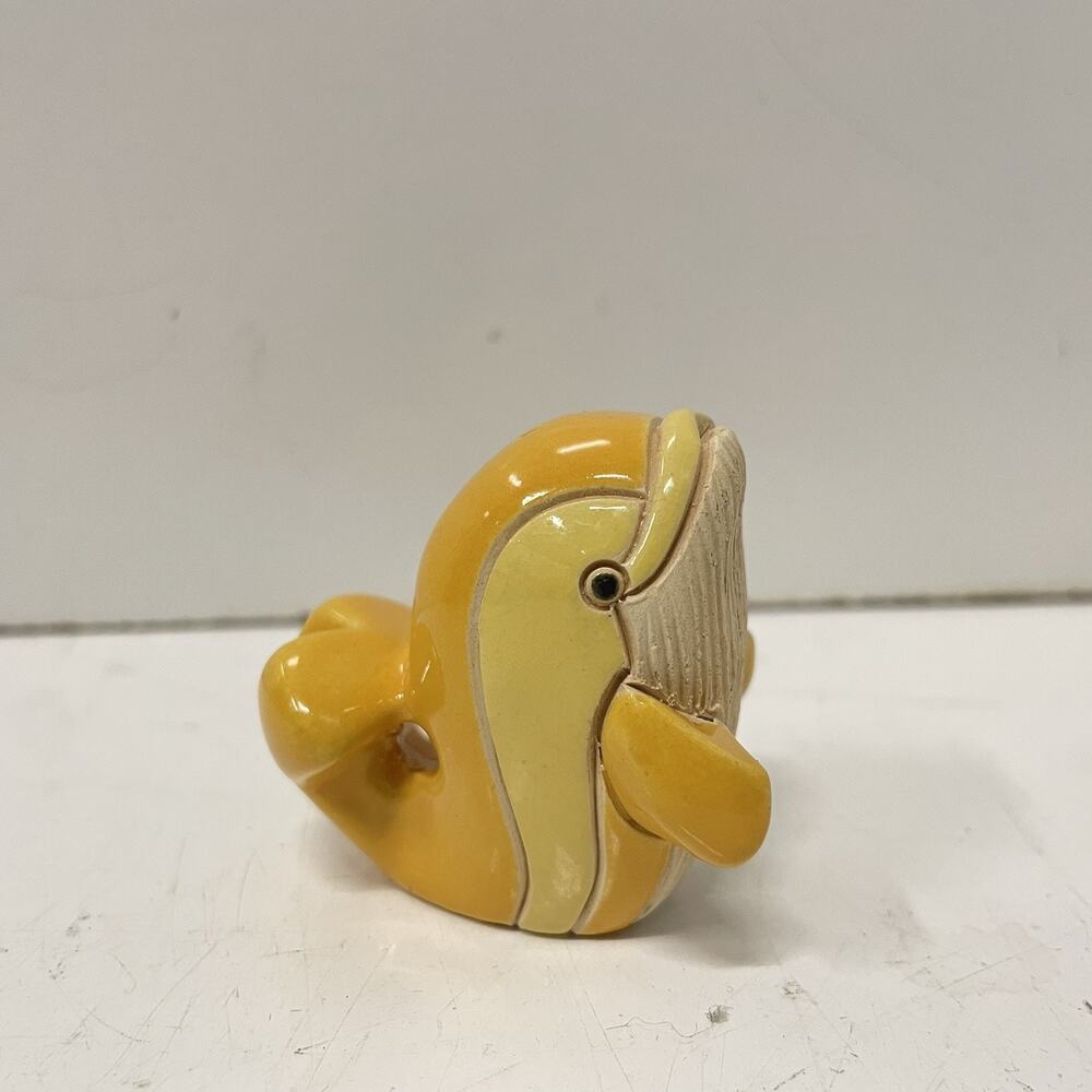 Artesania Rinconada De Rosa - J&J Carbajales Yellow Baby Dolphin #321 Retired